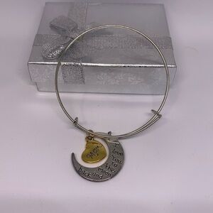 Gold and silver tone mom bracelet.